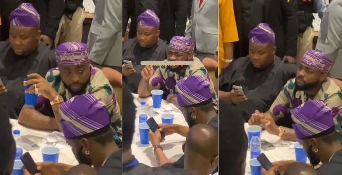 Davido's reaction as Burna Boy song is being played at Senator Bukola Saraki mother's burial party