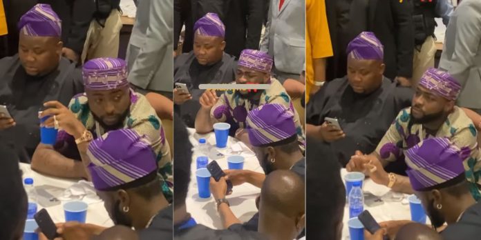 Davido's reaction as Burna Boy song is being played at Senator Bukola Saraki mother's burial party