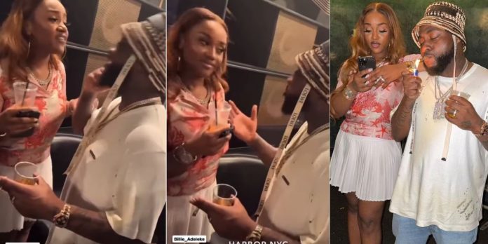 Mixed reactions trail video of Davido smoking cigar beside Chioma at a club in US